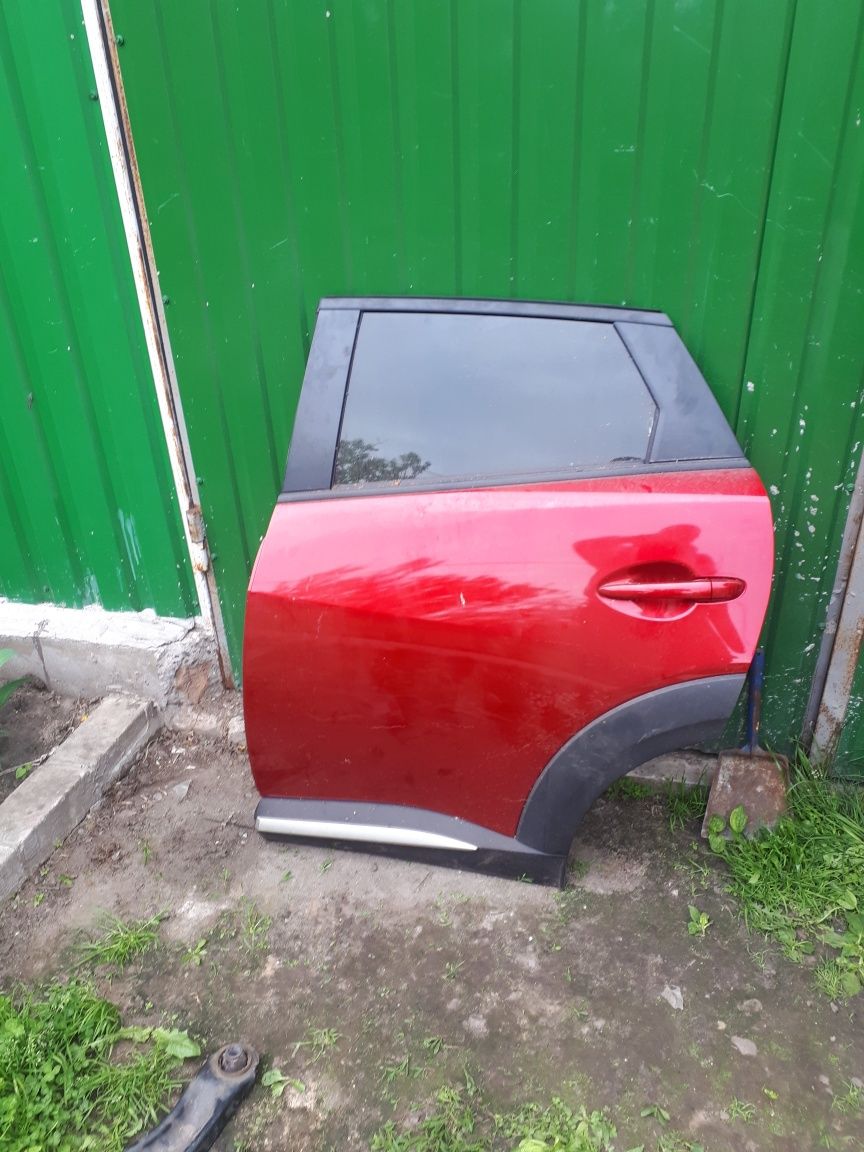 Дверь в сборе на Mazda cx3