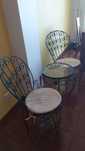 Conjunto de mesa e cadeiras em ferro forjado
