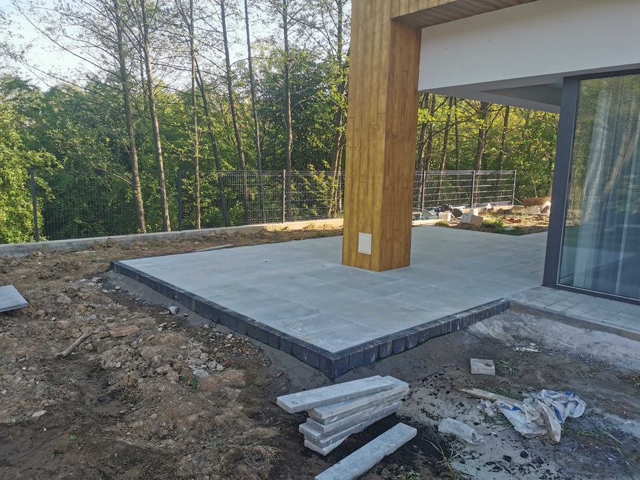 Brukarstwo Układanie kostki brukowej.