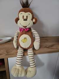 Maskotka-małpka z długimi nogami