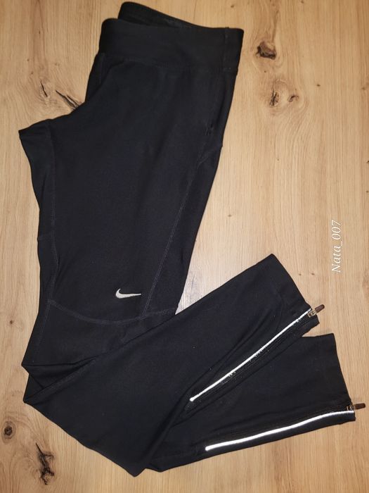 Spodnie leginsy Nike roz S Dri-Fit odblaski
