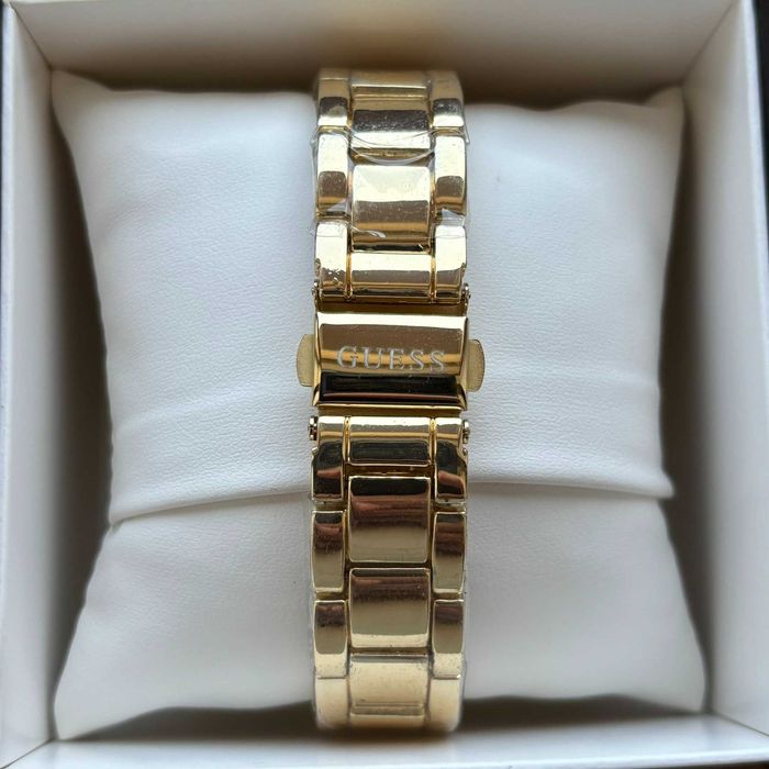 Жіночий годинник на браслеті Guess золотого кольору