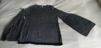 Sweter z długimi, rozszerzanymi rękawami