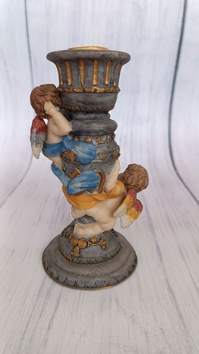 Castiçal anjos em marfinite