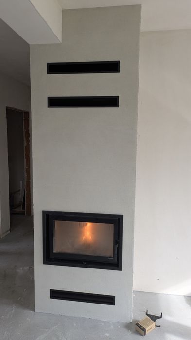 Nowoczesny kominek do rekuperacji z zabudową.