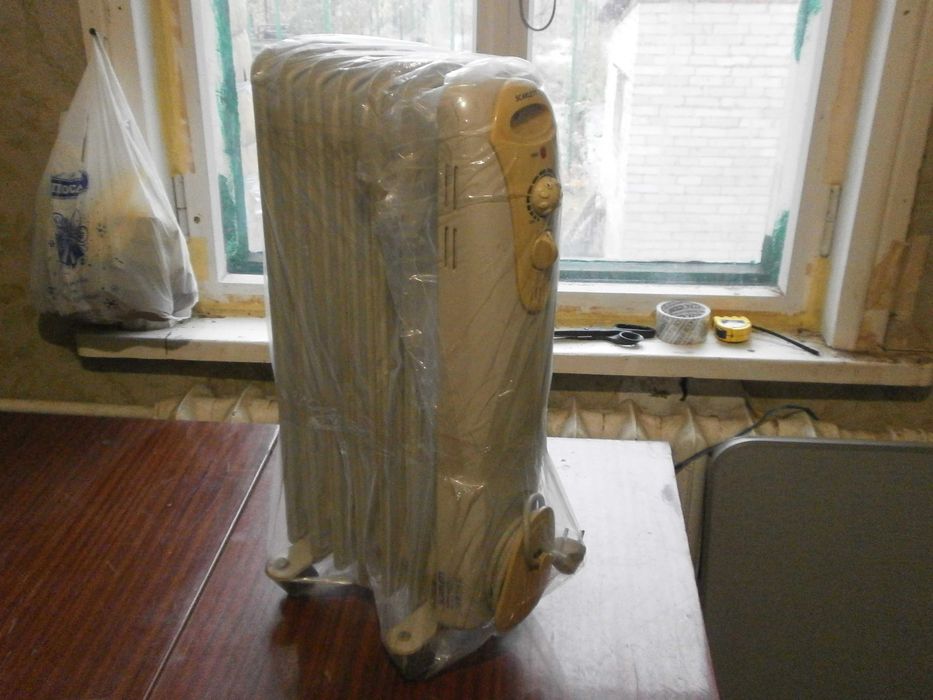 Масляный обогреватель Scarlet sc-1152