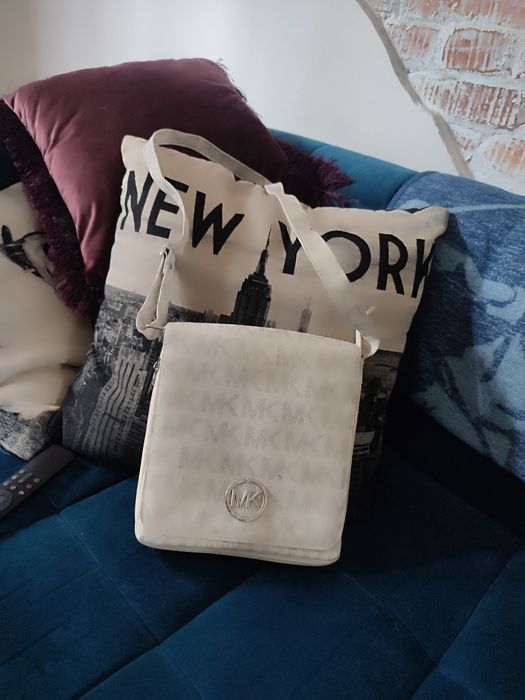 Listonoszka Michael Kors kremowa torebka shoperka