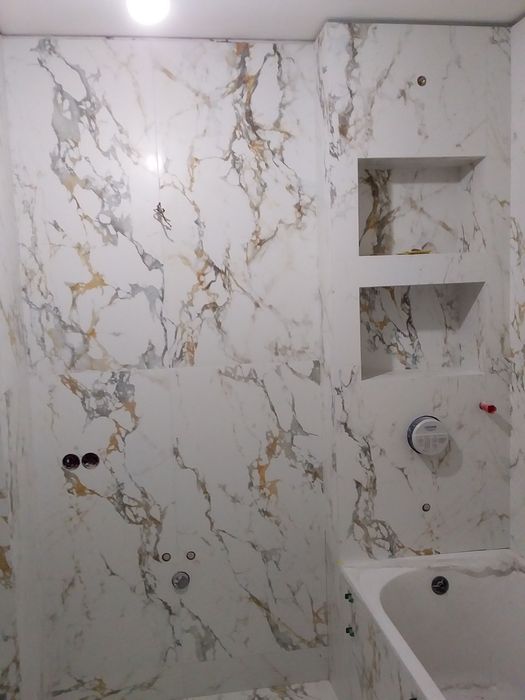 Плиточник, укладання  плитки різних форматів