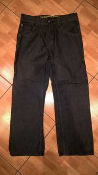 spodnie jeansy next r.134 nowe