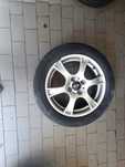 Vendo 4 jantes 16 4x100 com centro mini dois pneus novos
