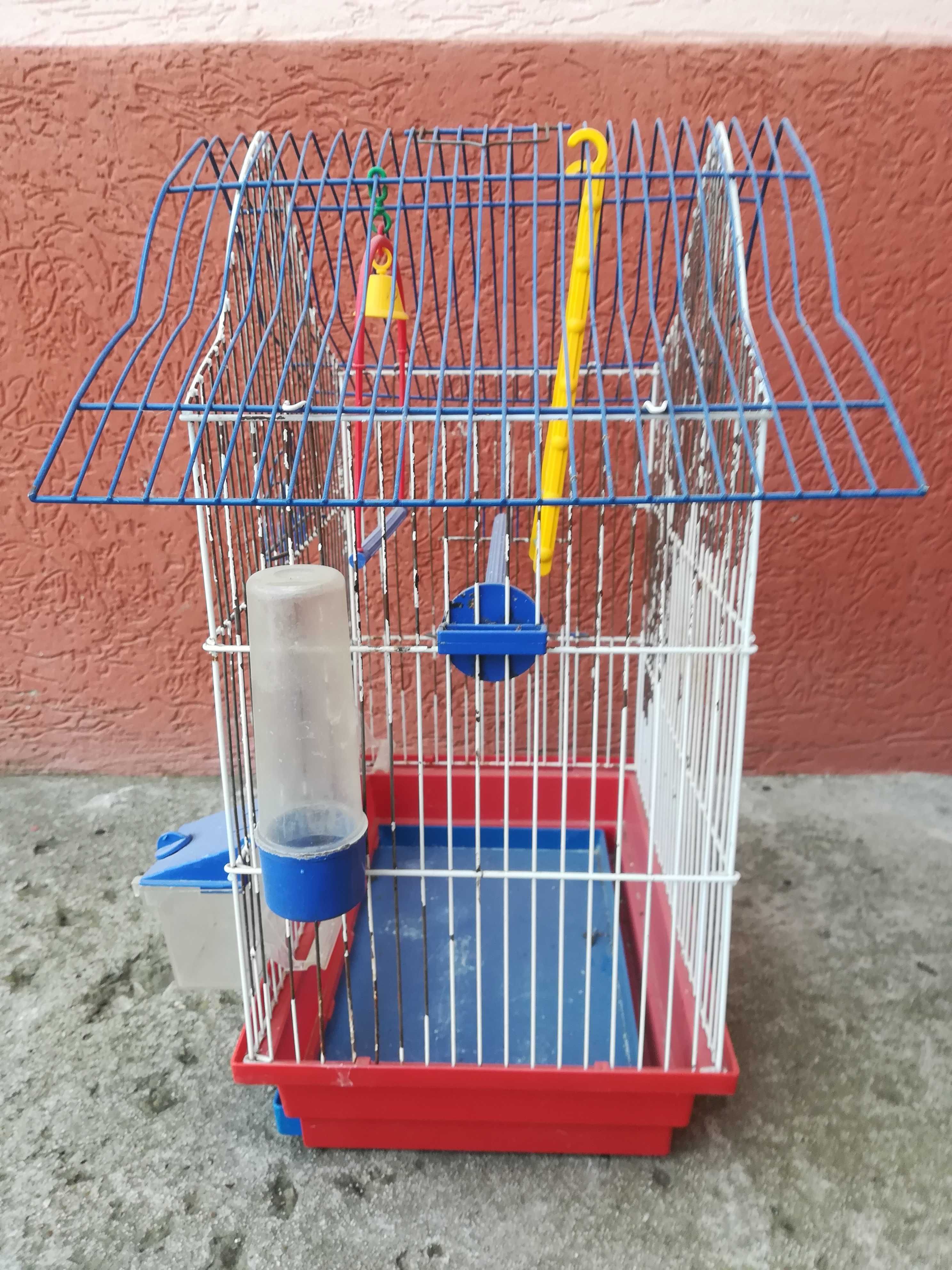 Клітка для маленького попугая