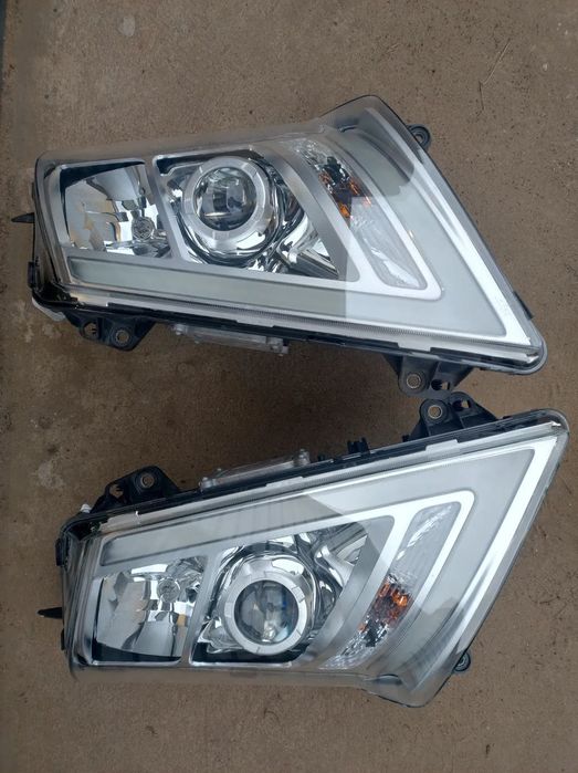 REFLEKTOR LAMPA VOLVO FH4 BI-XENON LEWA PRZÓD