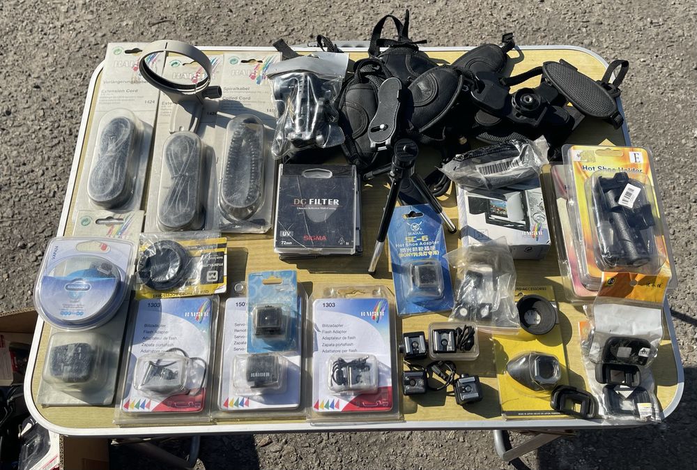 Комплекты фотопринадлежностей и аксессуаров.