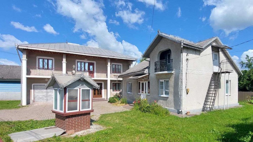 ДВА будинки та діл. 0,10 га, вул. Хотинська