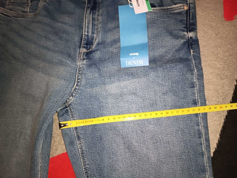 Nowe jeansy dzwony mid waist 42