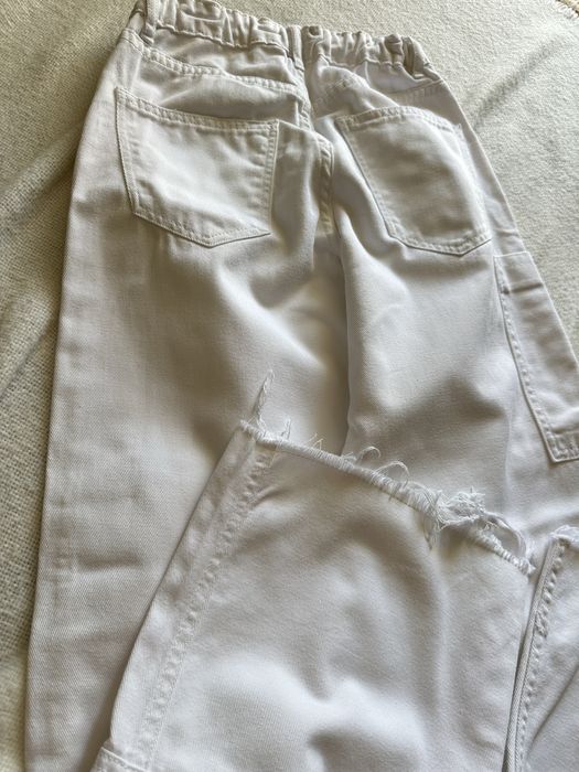 Білі джинси з кишенями 164см