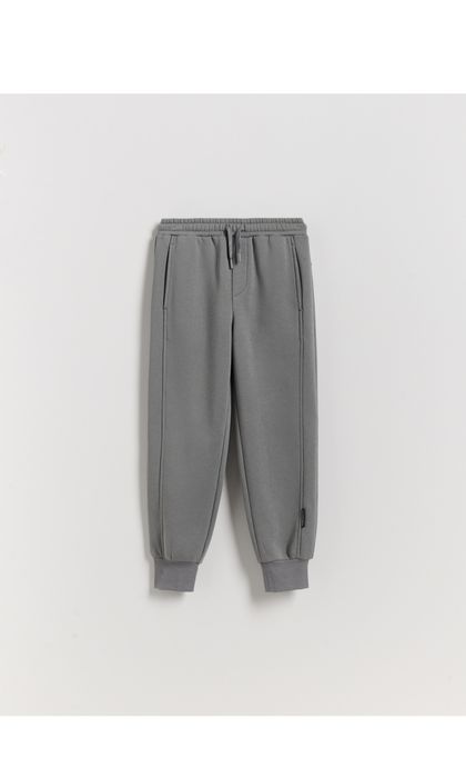 Нові теплі джогери Reserved 140 р..