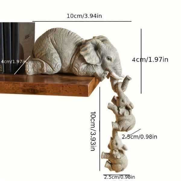Trzy figurki słonia przypinane do siebie