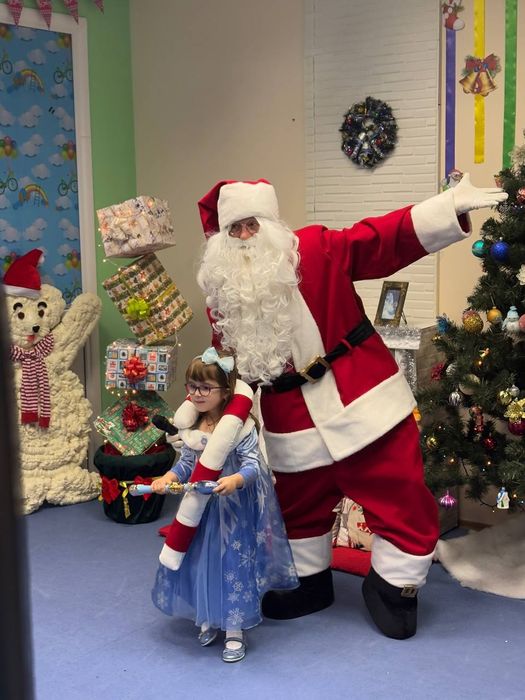 Санта Клаус і Ельфійка аніматори св. Миколай