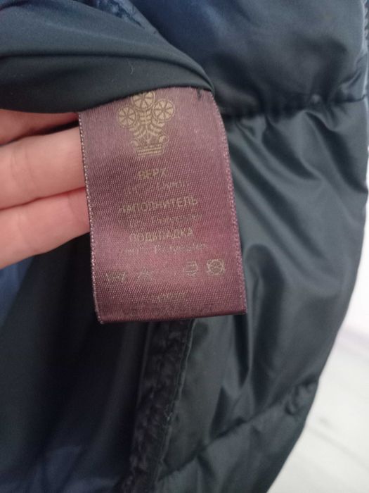 Пуховик зимовий чорний оздоблений  натуральним хутром