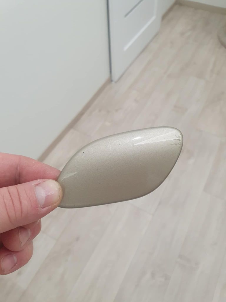 zaślepka spryskiwacza lampy lewej volvo S80II NR 306.554.58