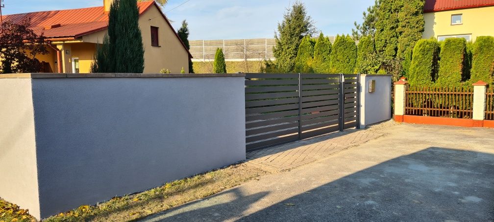 Ogrodzenia panelowe murowane montaż bram furtek mur oporowy fundament