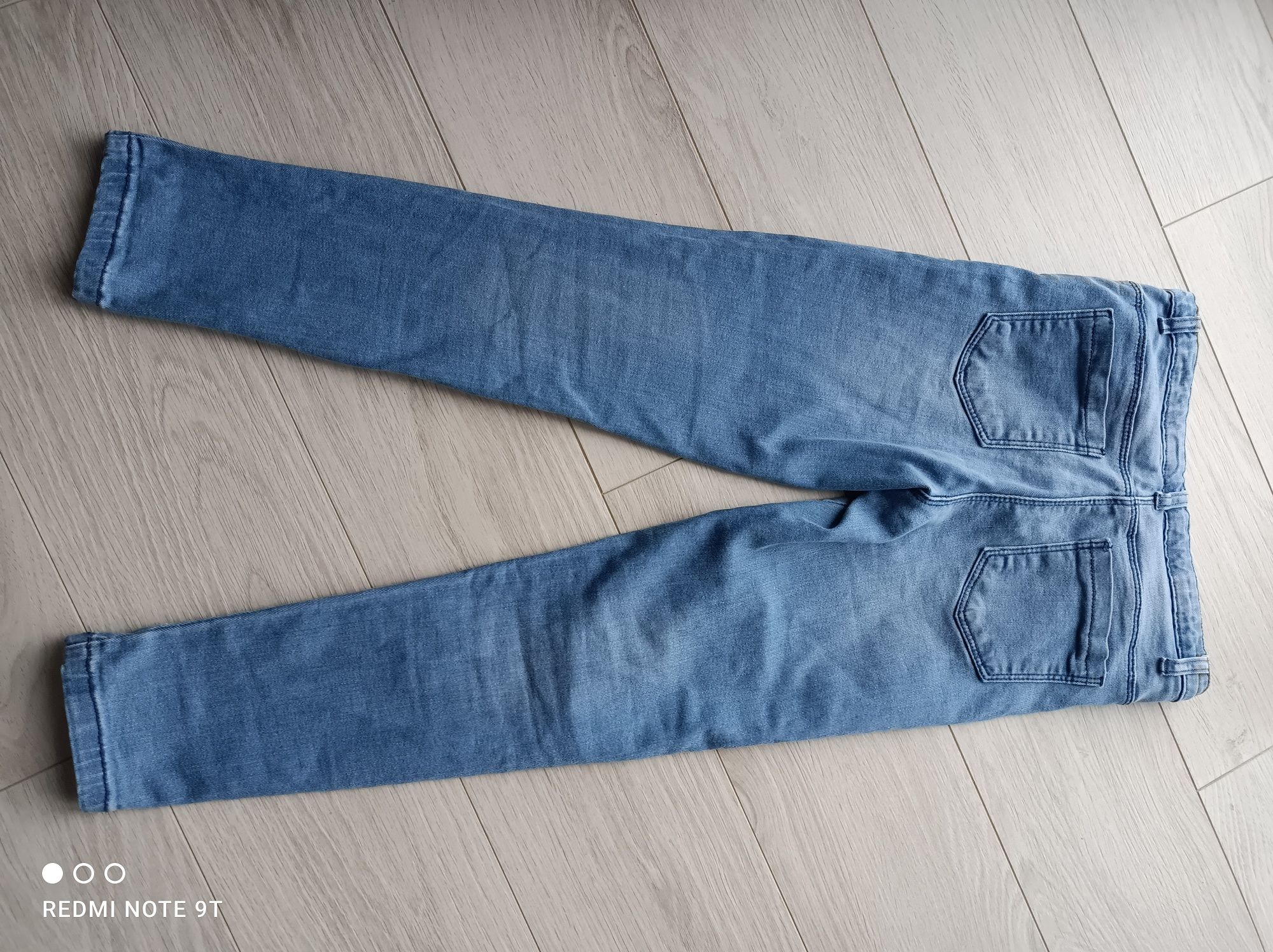 Spodnie  jeansy 128