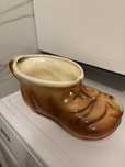 Ceramiczny but ozdoba