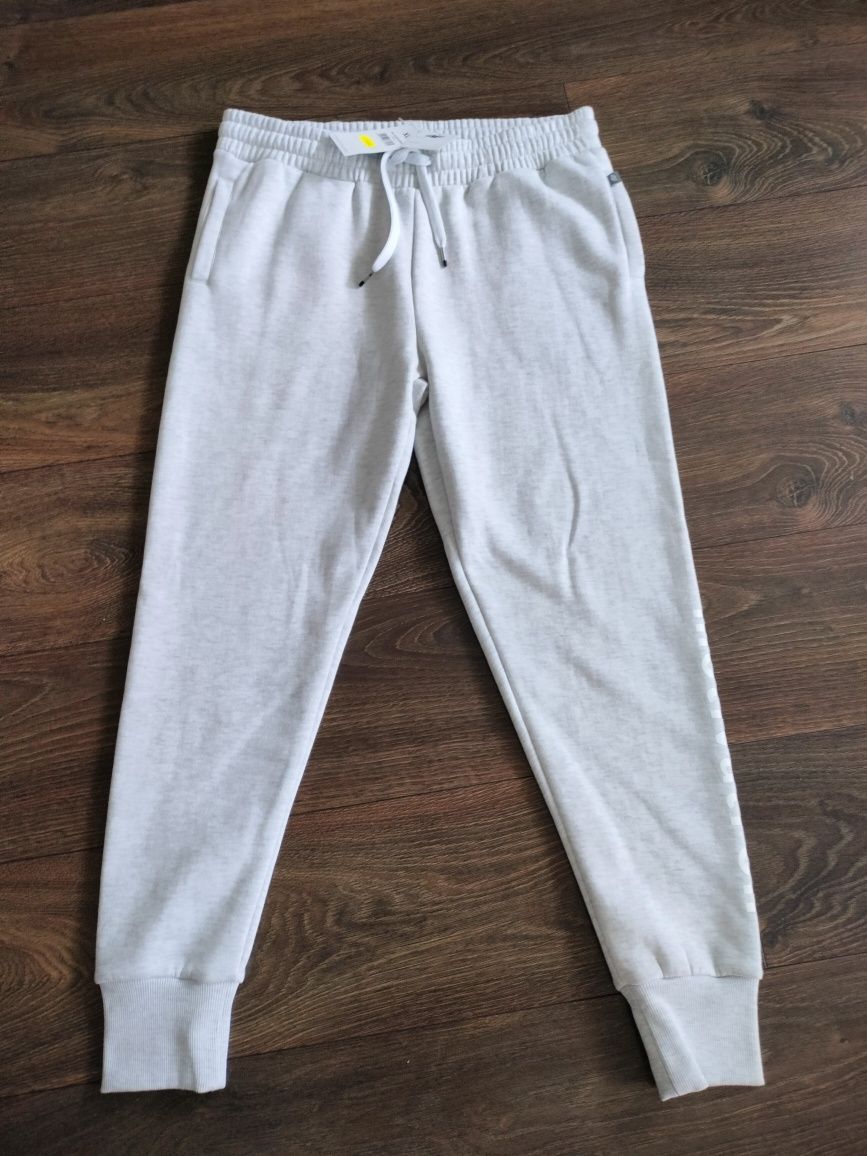 Nowe damskie spodnie dresowe 4F XL