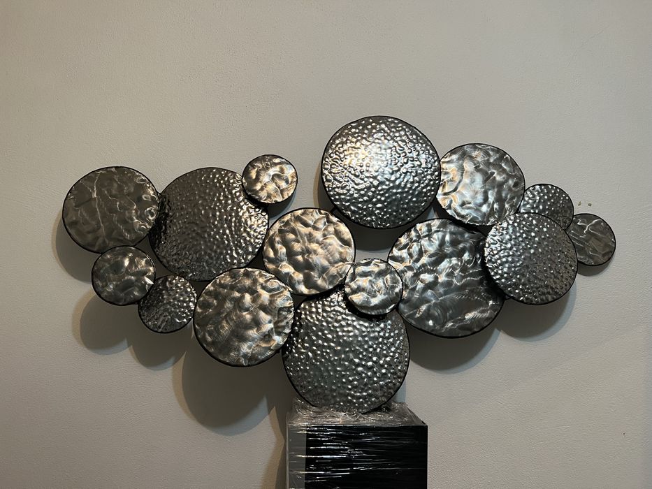 Peça decorativa em metal