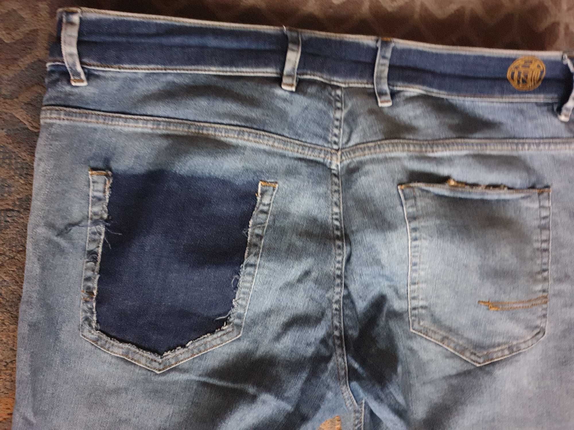 Spodnie jeansy męskie nowe 34 L Reserved