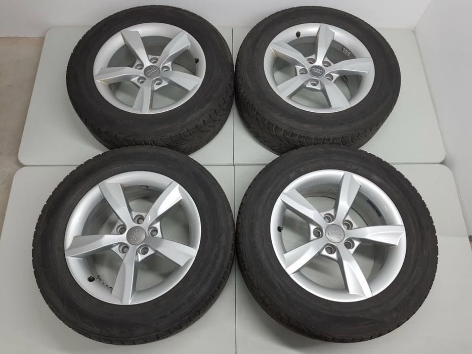 4 диска із шинами на audi