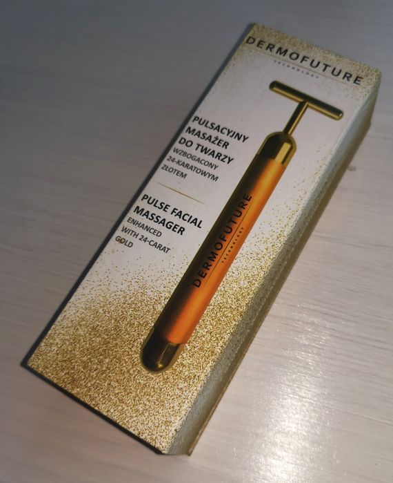Pulsacyjny masażer do twarzy z głowicą wzbogaconą 24-karatowym złotem