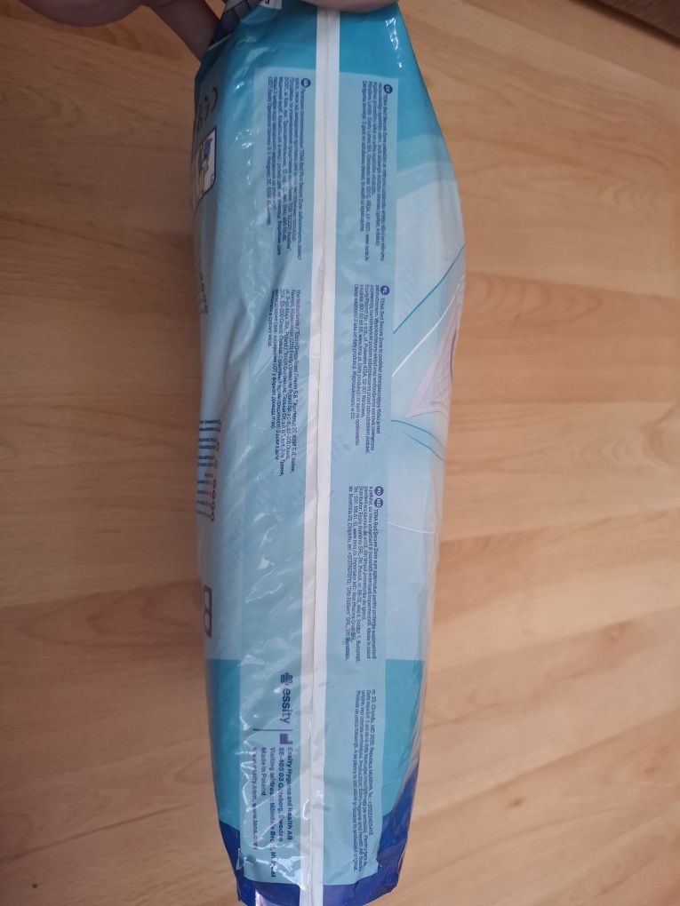 Podkłady higieniczne- Tena Bed Secure Zone Plus 5szt. Roz. 60x90cm.