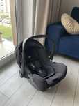 Fotelik samochodowy JOIE dla noworodka z ISOFIX / nosidełko