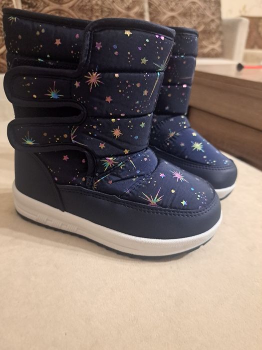 Продам зимові чоботи