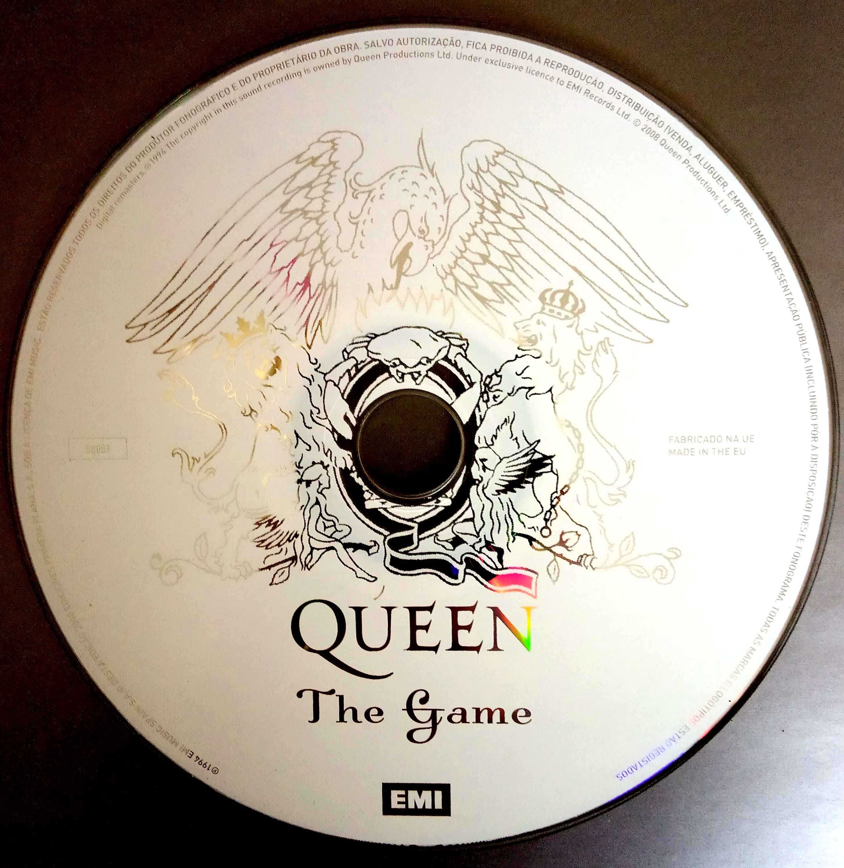 4 Livros com as letras das músicas  dos QUEEN mais os 4 DVD's