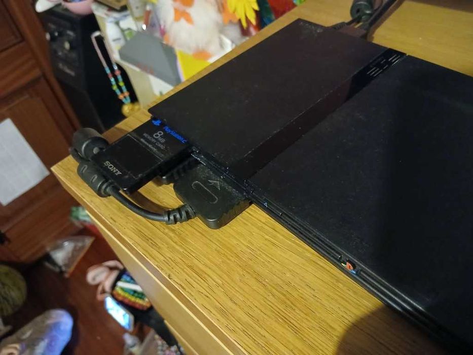 Ps2 Playstation 2 slim + 2 comandos + 20 jogos originais + c d memória