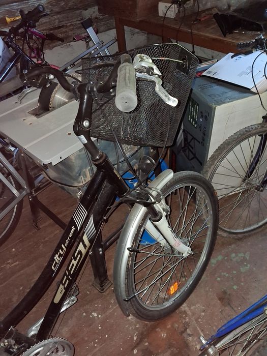 Rower miejski z fotelikiem dla dziecka