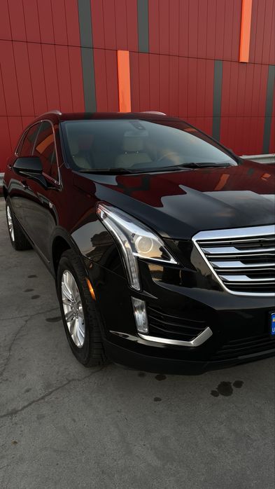 Чорний Каділлак. Пробіг 69000 км Стан нового автомобіля