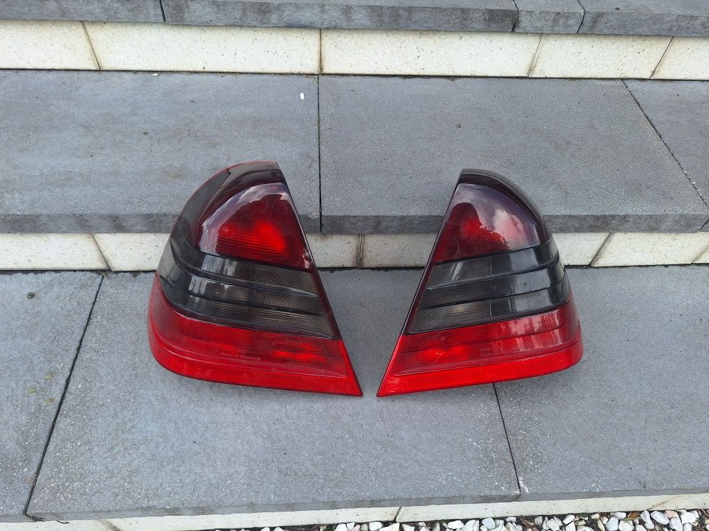 Lampy tylne dymione Mercedes c-klasa w202 oryginalne
