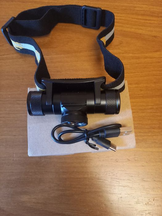 Продам фонарь налобный