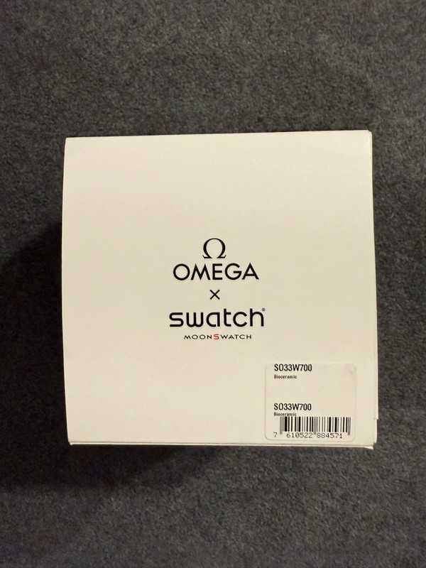 Omega Swatch Snoopy SO33W700 Księżycowy Labirynt Światła