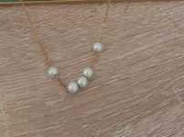 Fio Dourado em Aço com Pérolas
