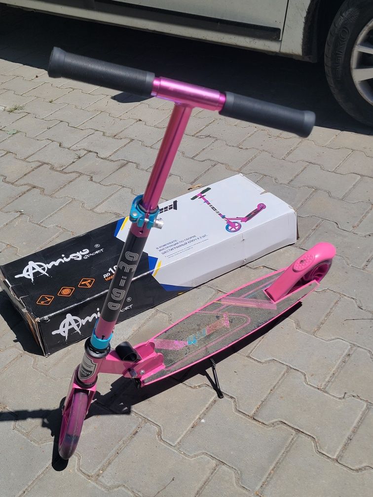 Самокат Amigosport.