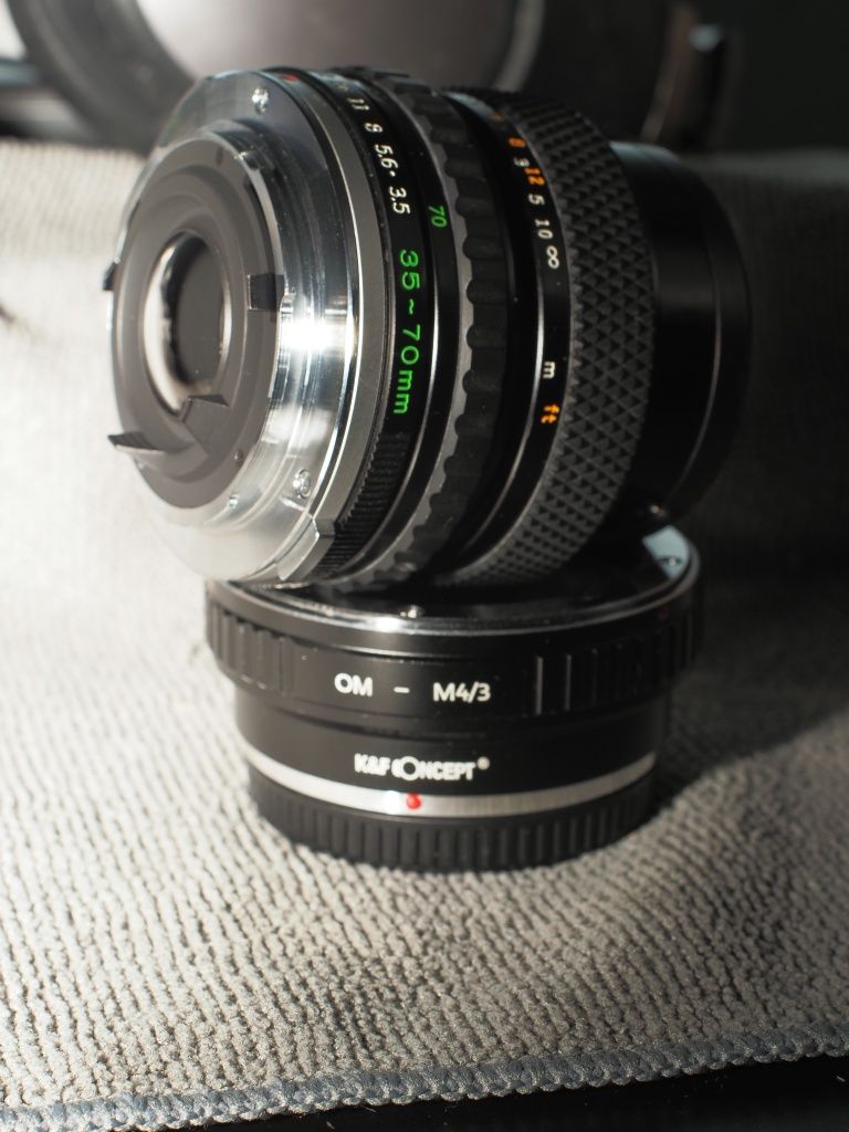 Obiektyw Oly om-system S zuiko auto-zoom 38-70 1:3,5-4,5 + K&F OM-M4/3