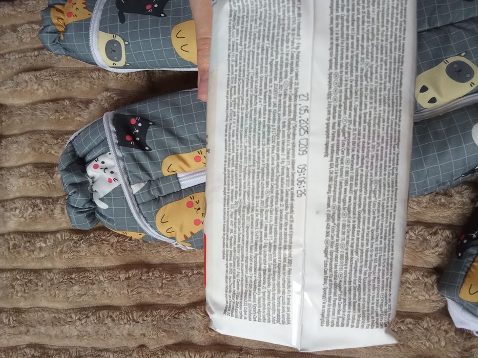 Продам памперси 1 і комбінезон трансформер