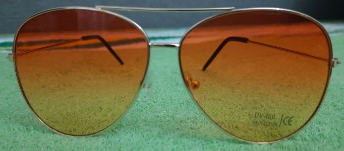 Стильні жіночі сонцезахисні окуляри