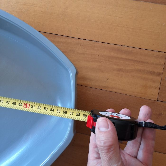 Caixa de areia de canto com areia