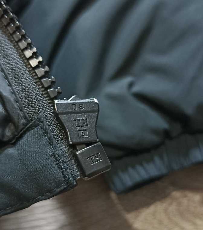 Пуховик від бренду lacoste originals